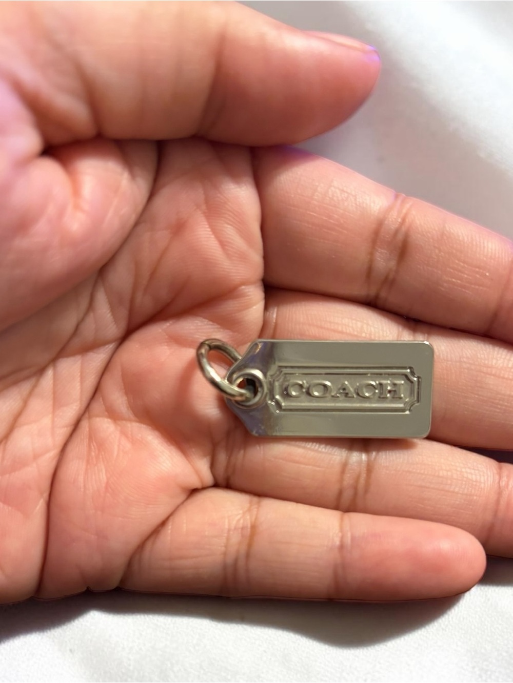 Coach Silver-tone Logo Tag Charm